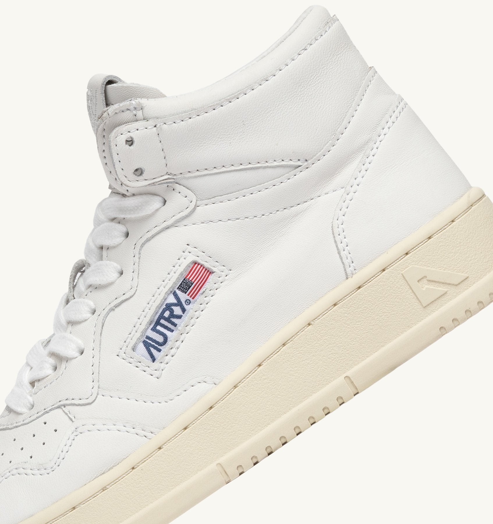 AUTRY - MEDALIST MID SNEAKERS IN SUPER-SOFT WHITE NAPPA (Men) - ASTOREHERE