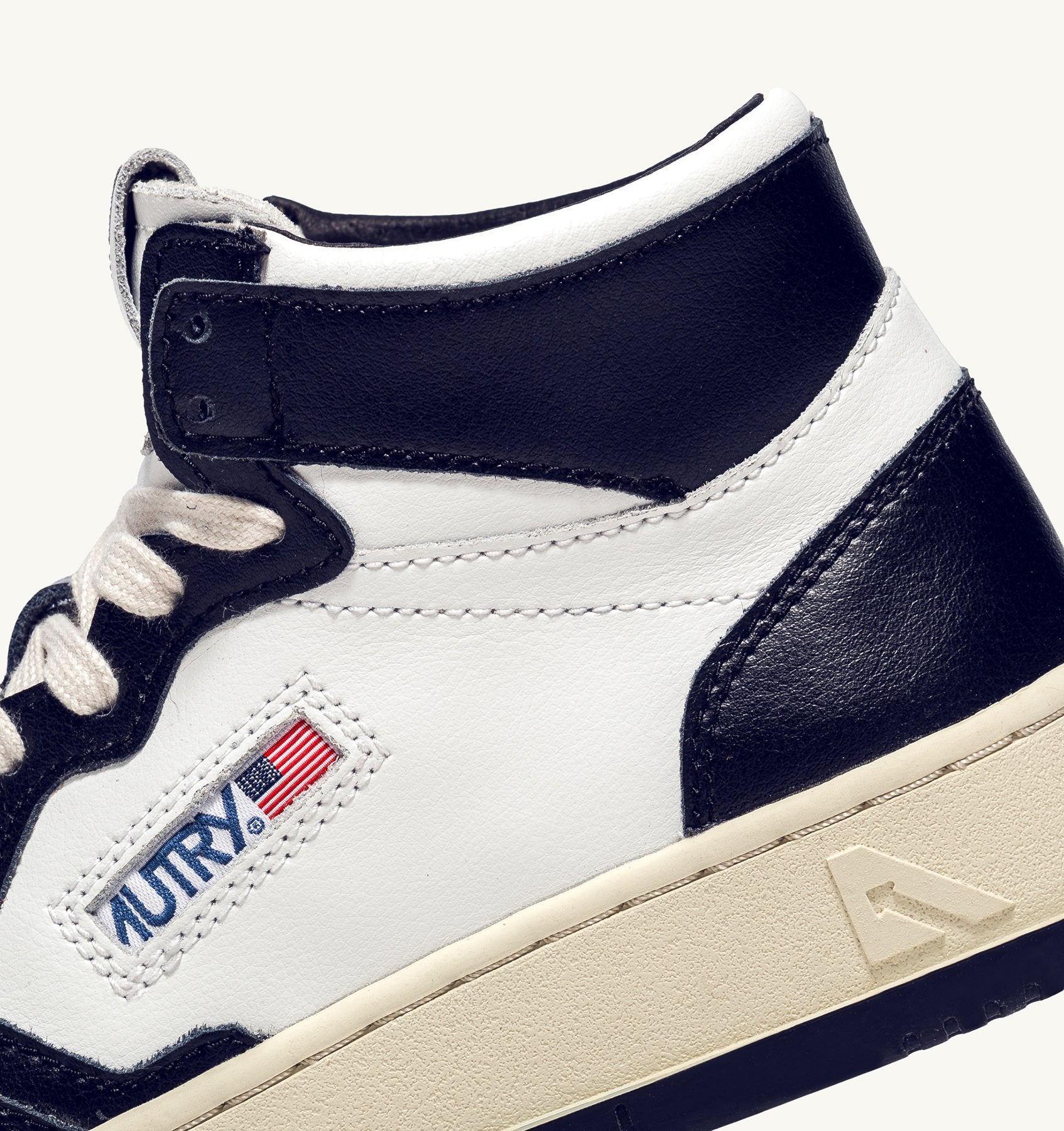 AUTRY - MEDALIST MID BICOLOR SNEAKERS IN WHITE AND BLUE LEATHER (Men) - ASTOREHERE