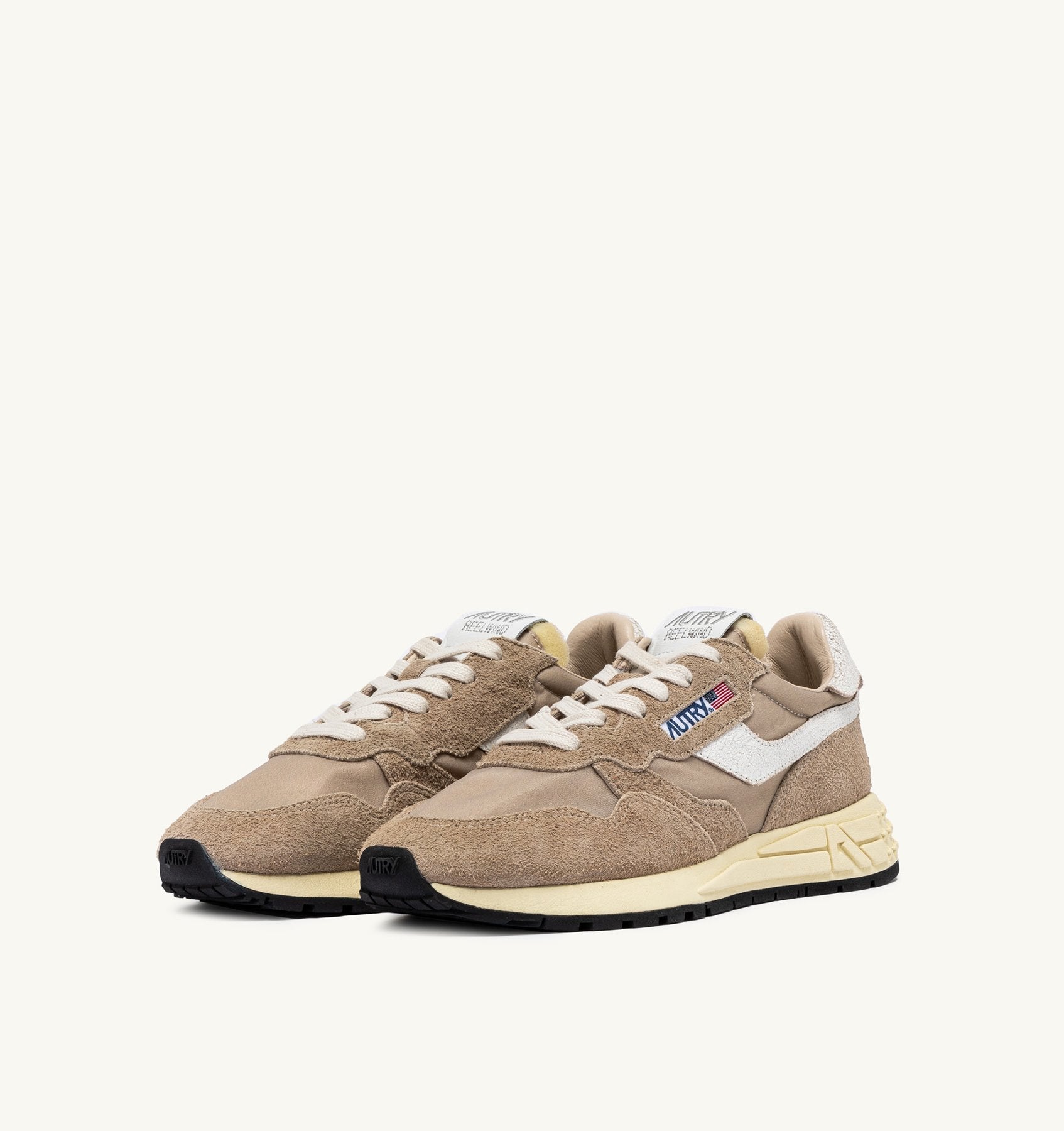 AUTRY - REELWIND LOW SNEAKERS IN PEPPER AND WHITE CRACKED LEATHER AND NYLON (Women) - ASTOREHERE