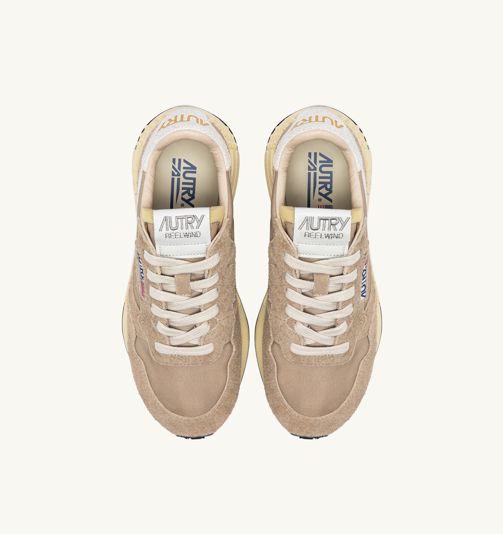 AUTRY - REELWIND LOW SNEAKERS IN PEPPER AND WHITE CRACKED LEATHER AND NYLON (Women) - ASTOREHERE
