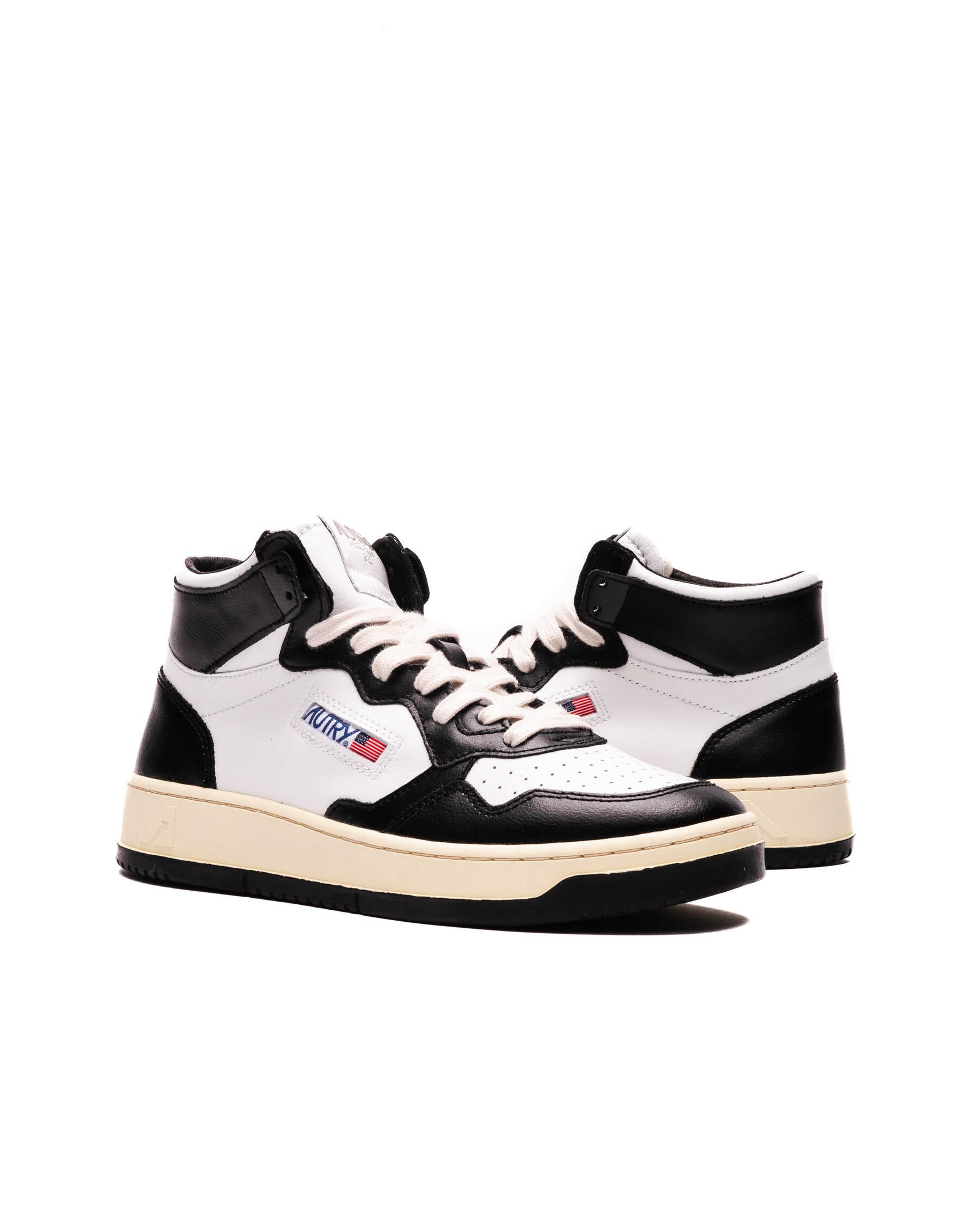 AUTRY - MEDALIST MID BICOLOR SNEAKERS IN WHITE AND BLACK LEATHER (Men) - ASTOREHERE