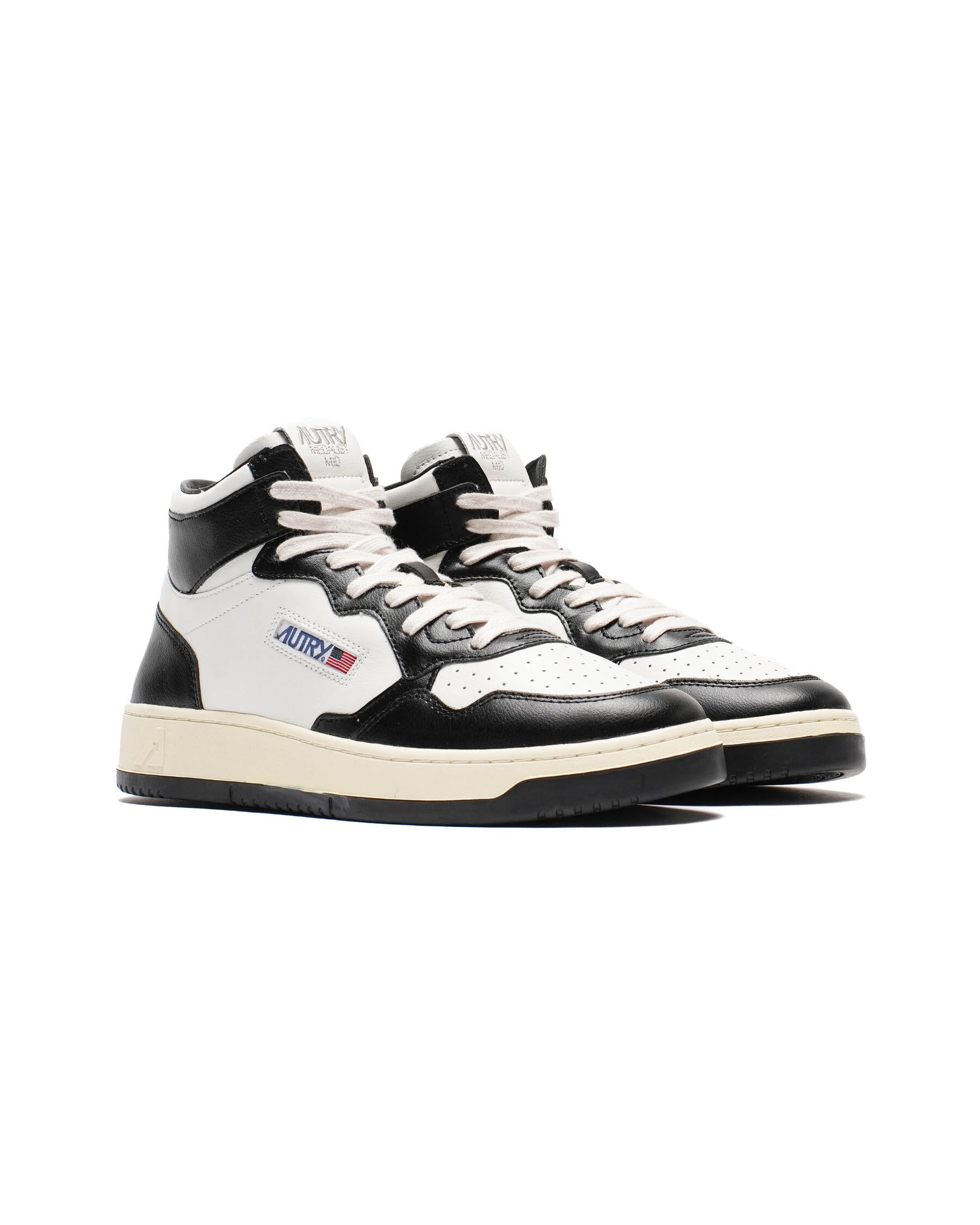 AUTRY - MEDALIST MID BICOLOR SNEAKERS IN WHITE AND BLACK LEATHER (Men) - ASTOREHERE