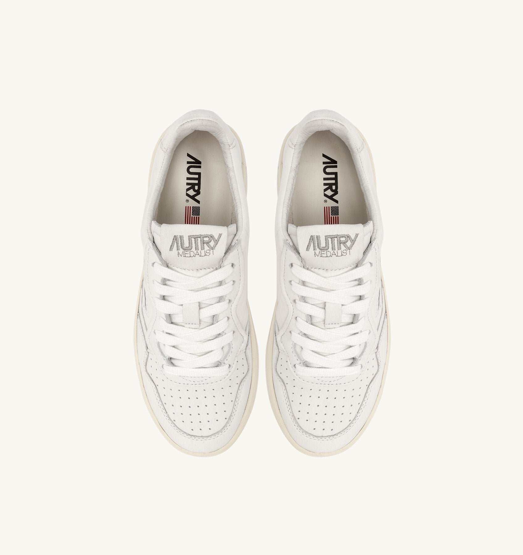 AUTRY - MEDALIST LOW SNEAKERS IN SUPER-SOFT WHITE NAPPA (Men) - ASTOREHERE