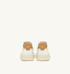 AUTRY - MEDALIST LOW SNEAKERS IN WHITE AND HONEY-YELLOW LEATHER (Men) - ASTOREHERE