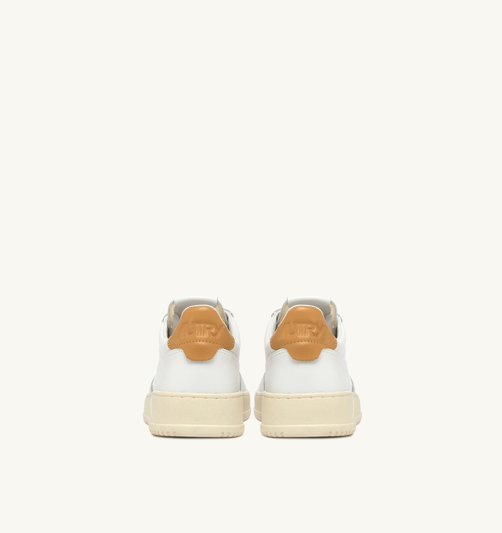 AUTRY - MEDALIST LOW SNEAKERS IN WHITE AND HONEY-YELLOW LEATHER (Men) - ASTOREHERE