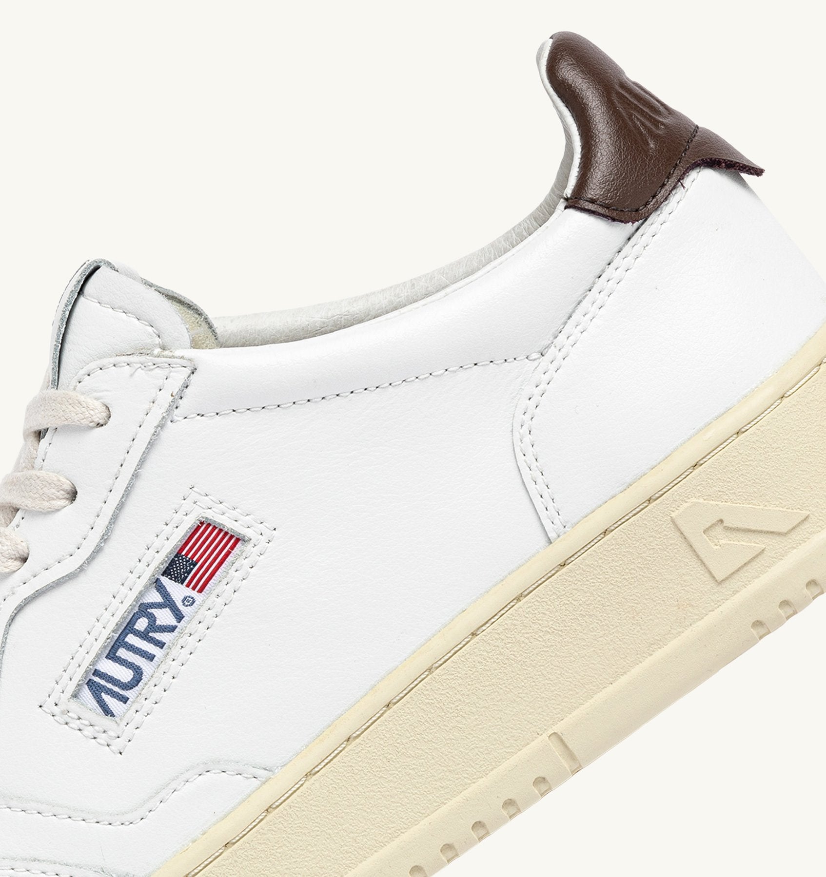 AUTRY - MEDALIST LOW SNEAKERS IN WHITE AND PINECONE LEATHER (Men) - ASTOREHERE