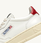 AUTRY - MEDALIST LOW SNEAKERS IN WHITE AND RED LEATHER (Women) - ASTOREHERE