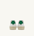 AUTRY - MEDALIST LOW SNEAKERS IN WHITE AND GREEN LEATHER (Men) - ASTOREHERE