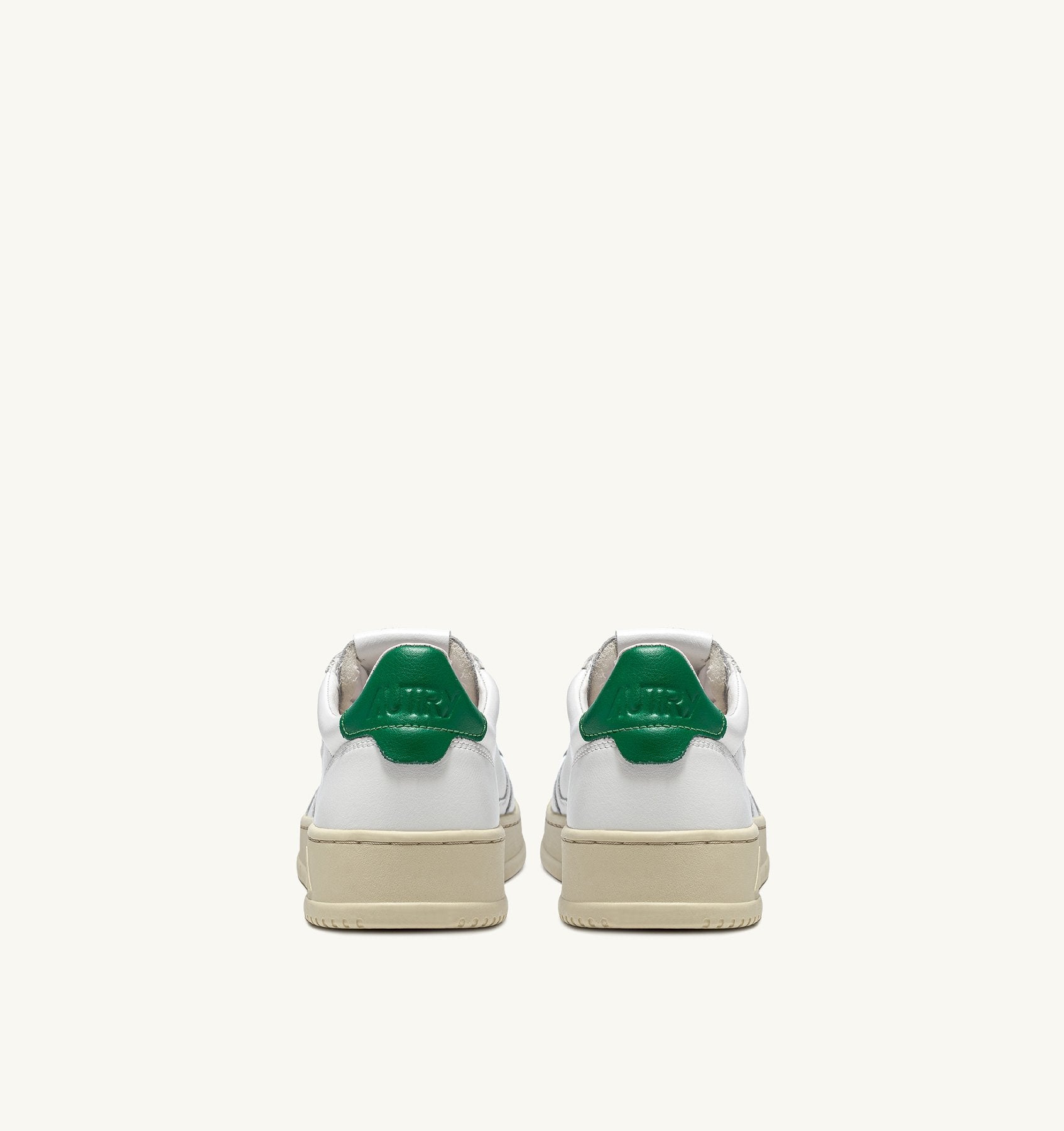 AUTRY - MEDALIST LOW SNEAKERS IN WHITE AND GREEN LEATHER (Men) - ASTOREHERE