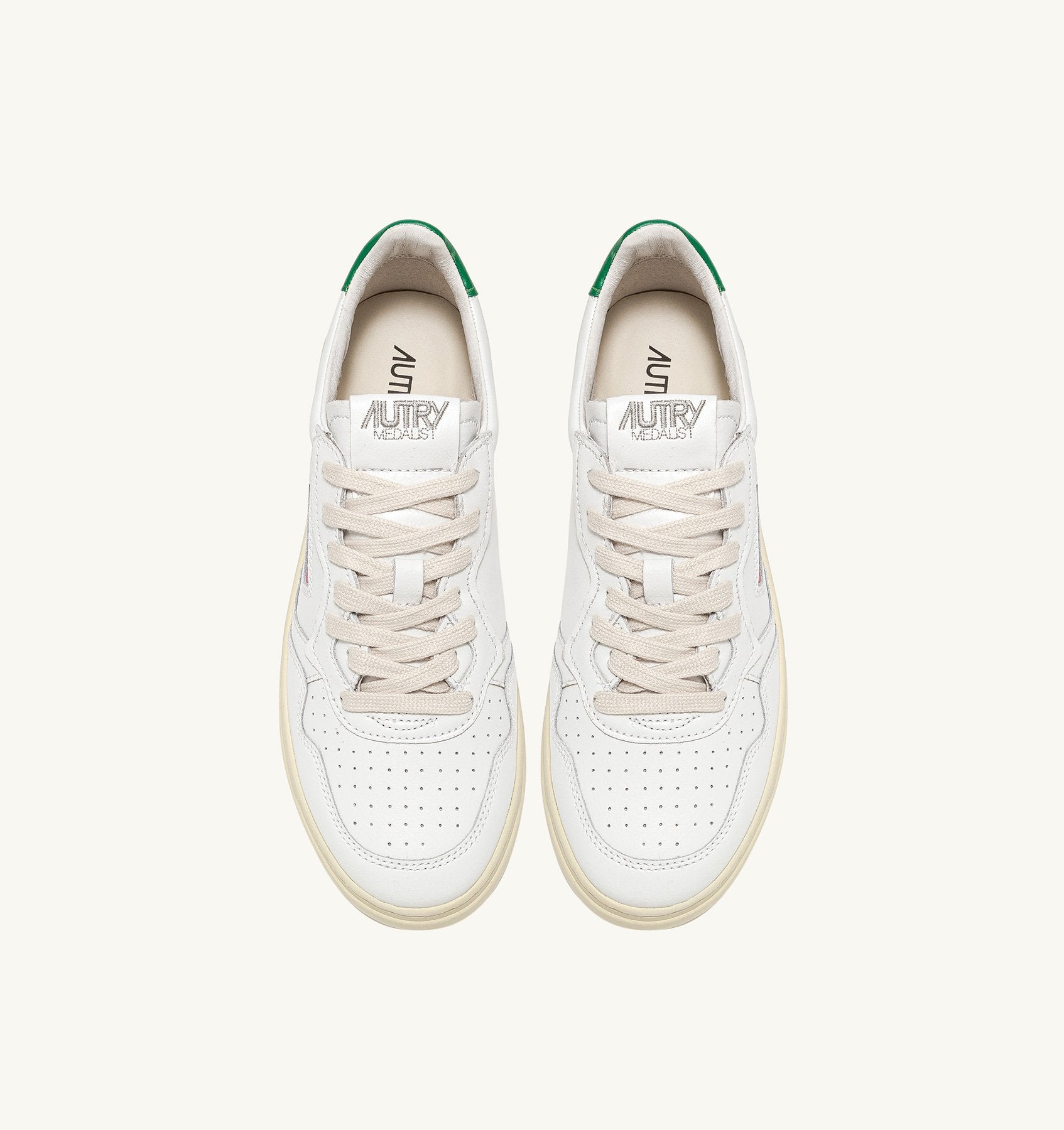 AUTRY - MEDALIST LOW SNEAKERS IN WHITE AND GREEN LEATHER (Women) - ASTOREHERE