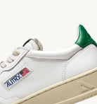 AUTRY - MEDALIST LOW SNEAKERS IN WHITE AND GREEN LEATHER (Men) - ASTOREHERE