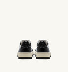 AUTRY - MEDALIST LOW BICOLOR SNEAKERS IN WHITE AND BLACK LEATHER (Women) - ASTOREHERE