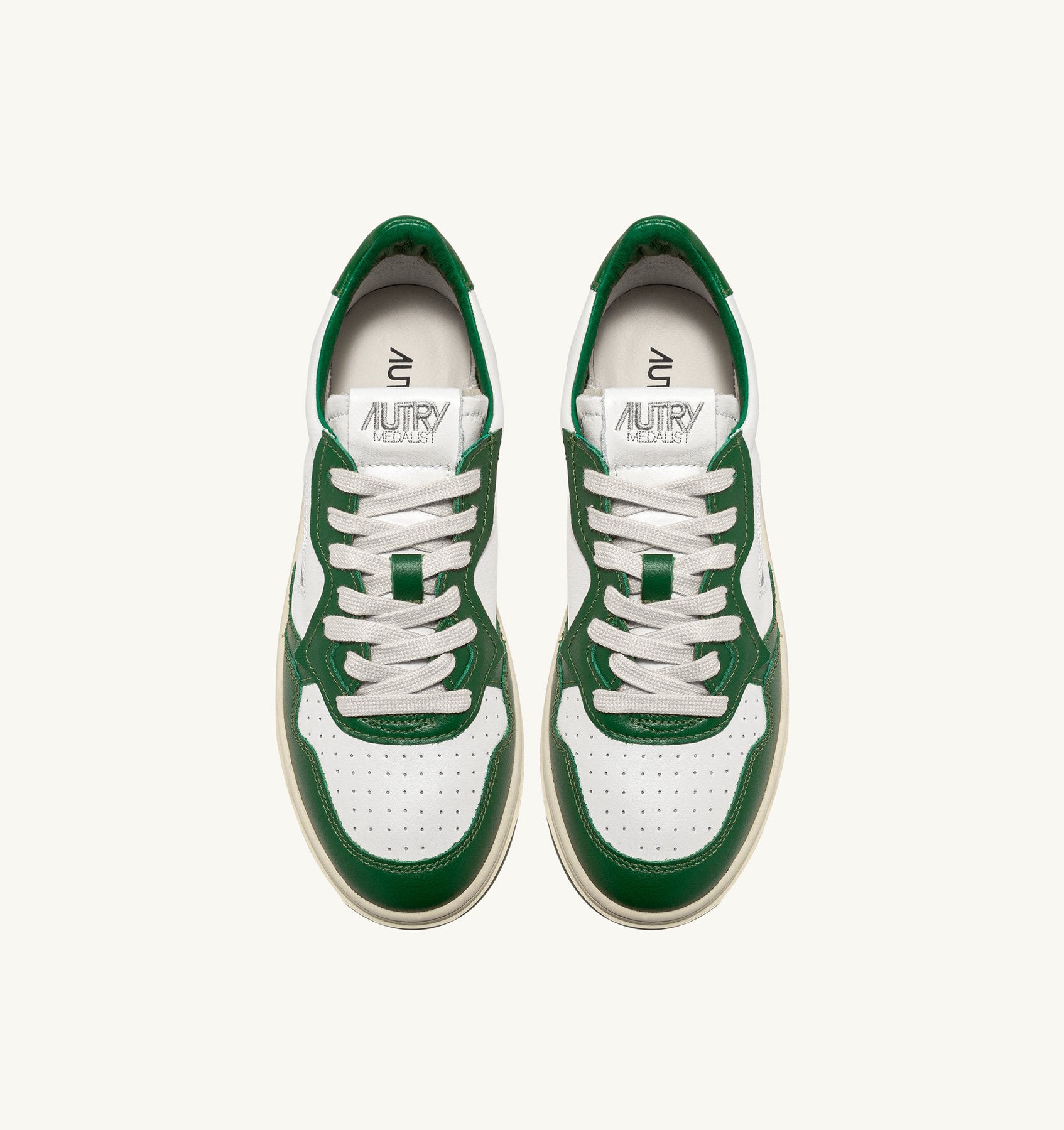 AUTRY - MEDALIST LOW BICOLOR SNEAKERS IN WHITE AND GREEN LEATHER (Women) - ASTOREHERE