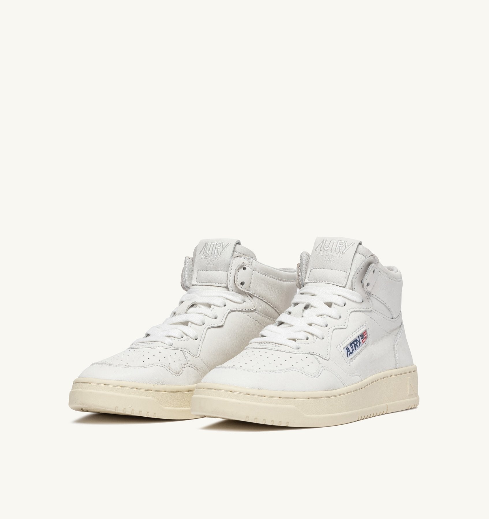 AUTRY - MEDALIST MID SNEAKERS IN SUPER-SOFT WHITE NAPPA (Men) - ASTOREHERE