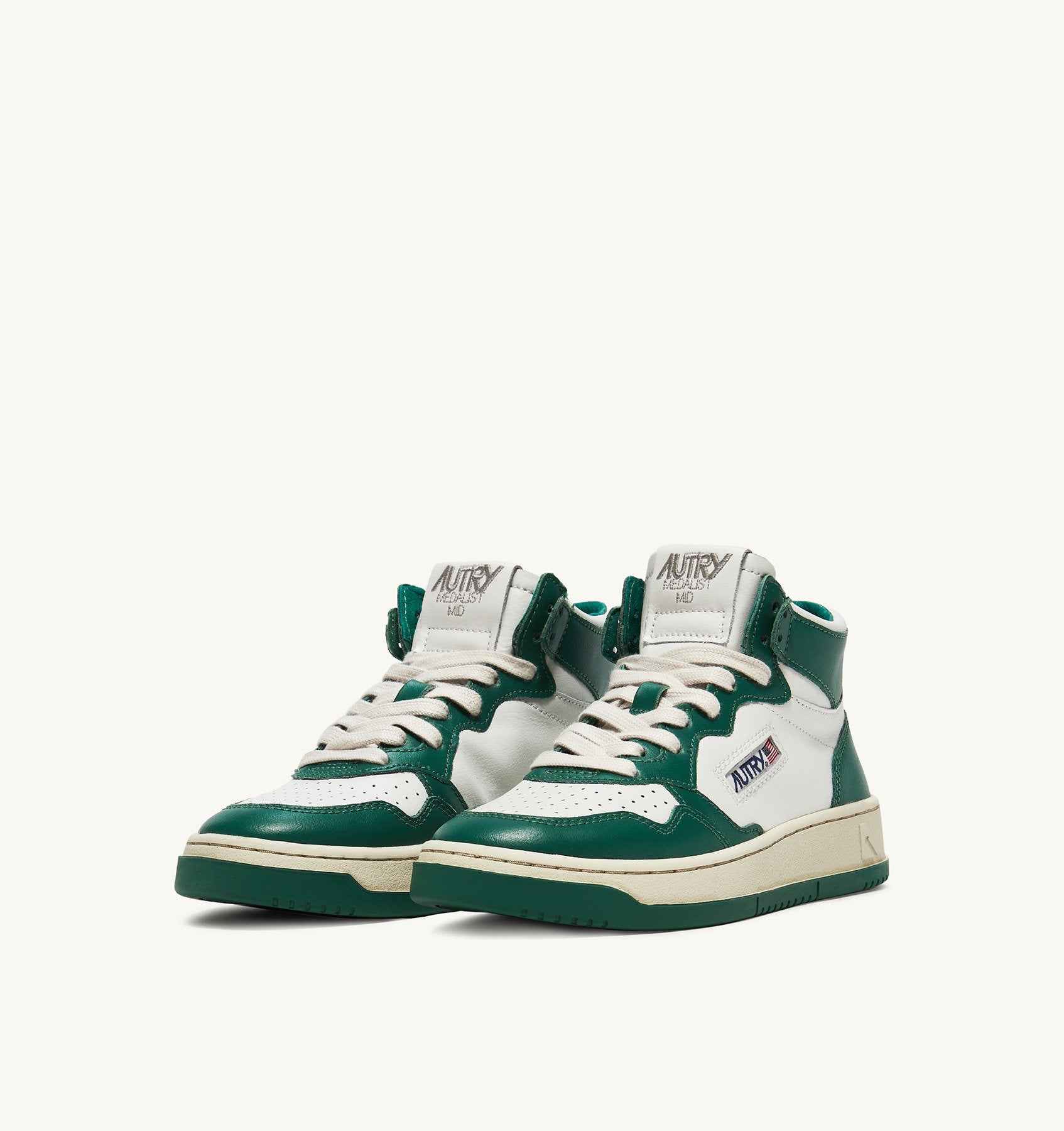 AUTRY - MEDALIST MID BICOLOR SNEAKERS IN WHITE AND GREEN LEATHER (Women) - ASTOREHERE