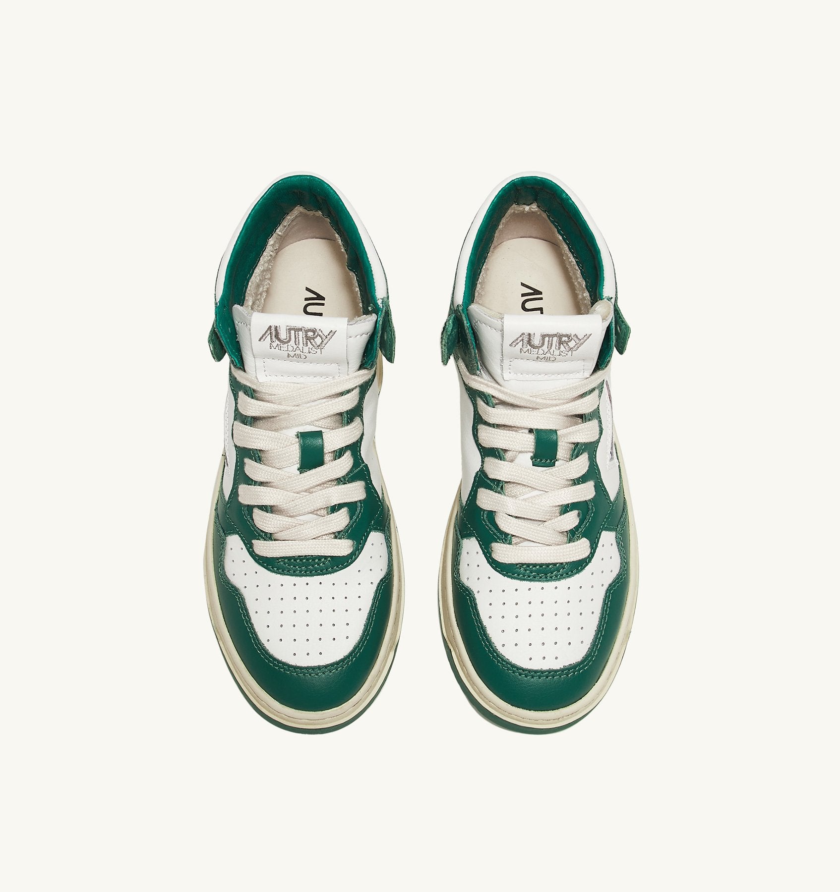 AUTRY - MEDALIST MID BICOLOR SNEAKERS IN WHITE AND GREEN LEATHER (Women) - ASTOREHERE