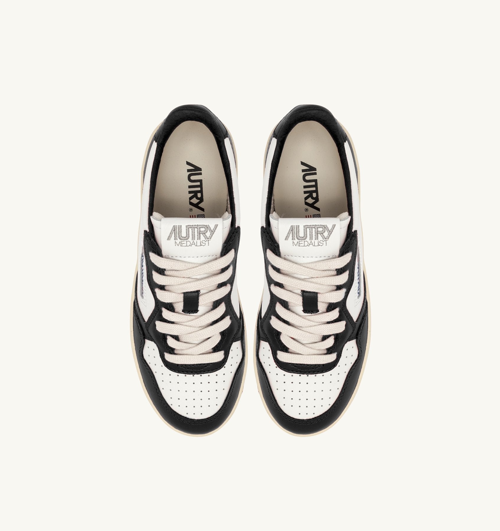 AUTRY - MEDALIST PLATFORM SNEAKERS IN WHITE AND BLACK LEATHER (Women) - ASTOREHERE